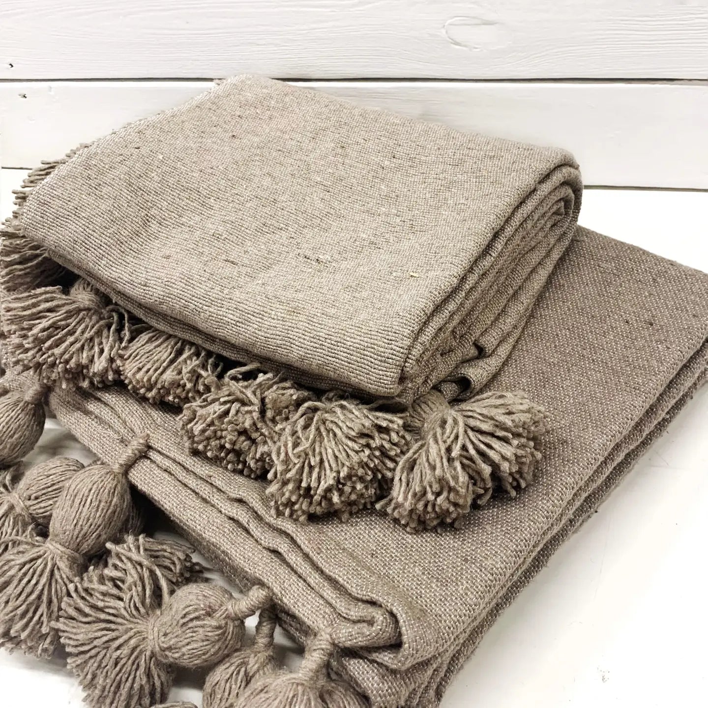 Grote katoenen plaid met pompon